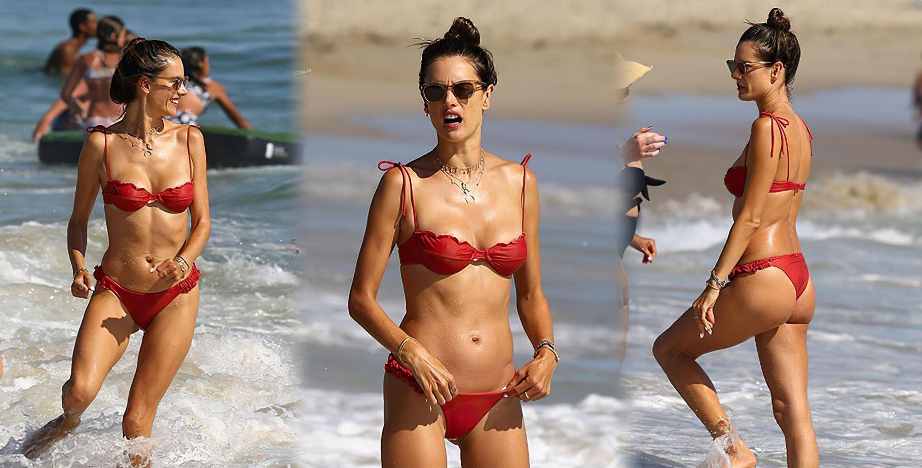 Alessandra Ambrosio looks fabulous in a red bikini as she is seen cooling off at the beach | Best Of Comic Books