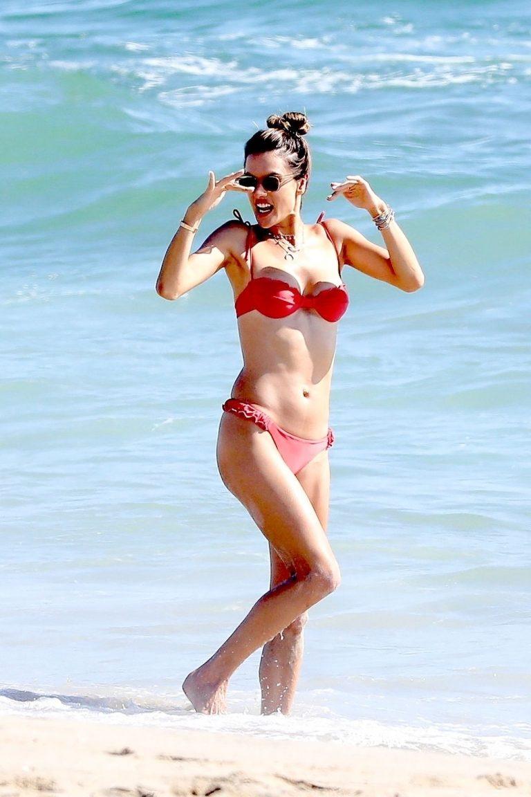 Alessandra Ambrosio looks fabulous in a red bikini as she is seen cooling off at the beach | Best Of Comic Books