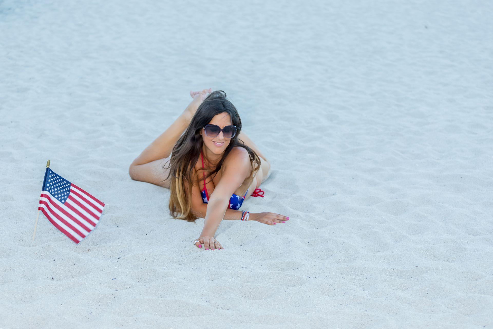American Bikini babe Claudia Romani honours 4th July as she poses in a bikini on South Beach | Best Of Comic Books