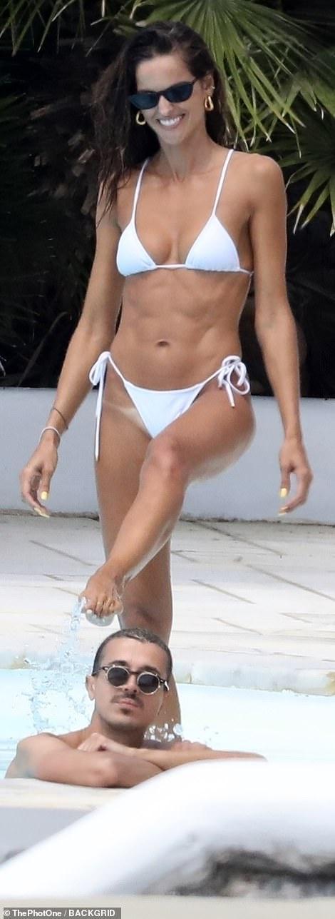 Izabel Goulart Flaunts her sexy figure in a barely-there white bikini | Best Of Comic Books