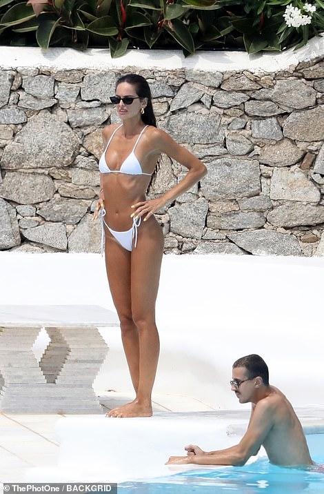 Izabel Goulart Flaunts her sexy figure in a barely-there white bikini | Best Of Comic Books