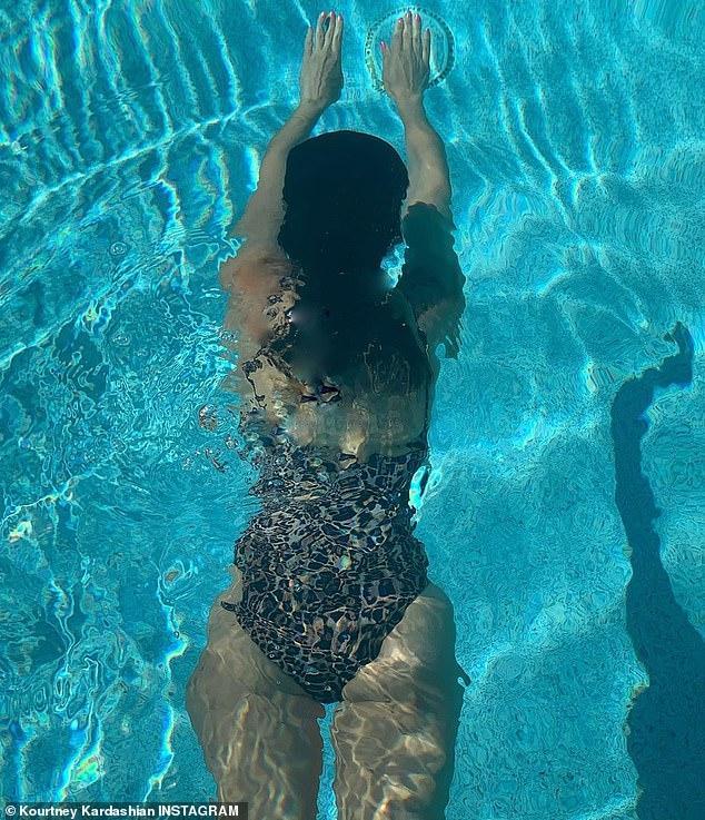 Kourtney Kardashian shows off her bomb figure in a leopard-print Good American swimsuit | Best Of Comic Books