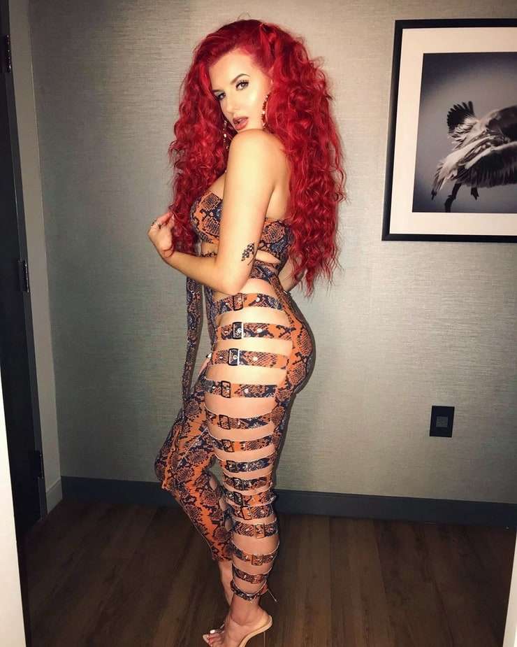 US rapper sets braless assets free in completely sheer top - Daily Star