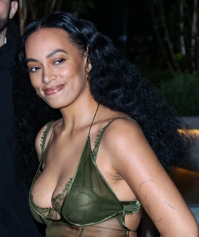 Solange Knowles in a tiny green and sheer top