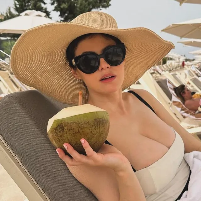 Alexandra Daddario is proud of her coconuts