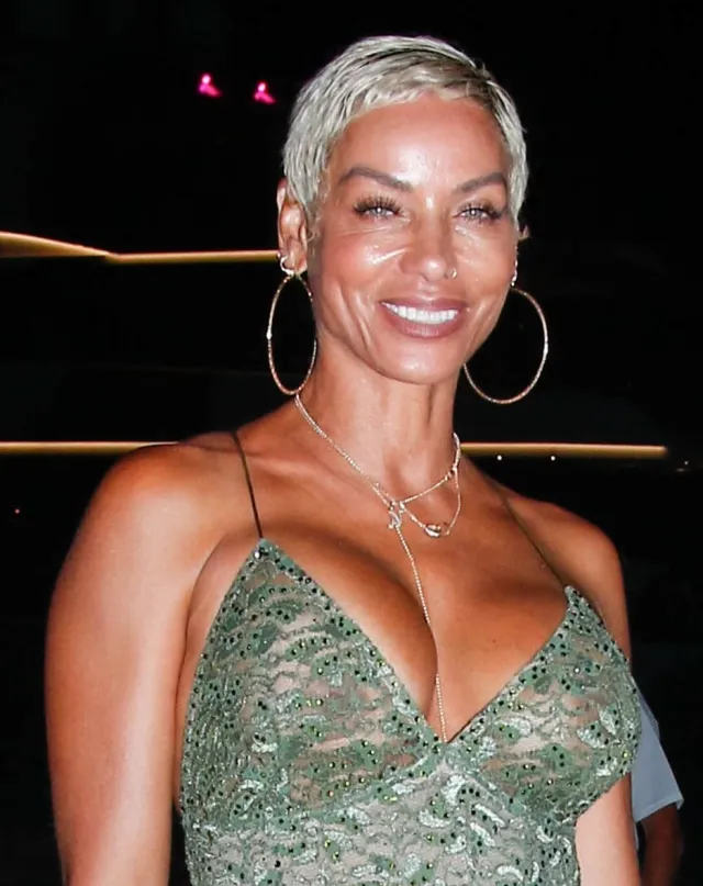 Nicole Murphy in a See-Through Dress