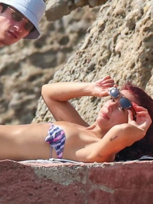 Dua Lipa in bikini on a beach – August 6, 2024