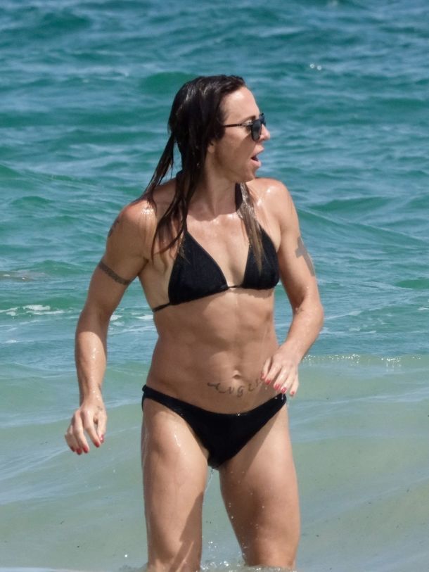 Melanie Chisholm in black bikini at the beach in Ibiza – September 01, 2024